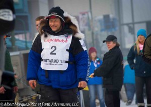 Martin Buser at the Ceremonial Start on 4th Avenue, Iditarod 2013. Photo by Albert Marquez/Planet Earth Adventures, LLC