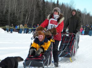 Jodi Bailey and Dan Kaduce and their Idita-rider, Daniel Faltyn, coming into Campbell Airstrip... (photo by Helen Hegener/Northern Light Media)