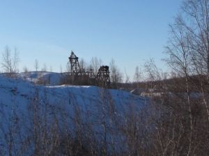 A gold dredge near the F.E. Co. Gold Camp